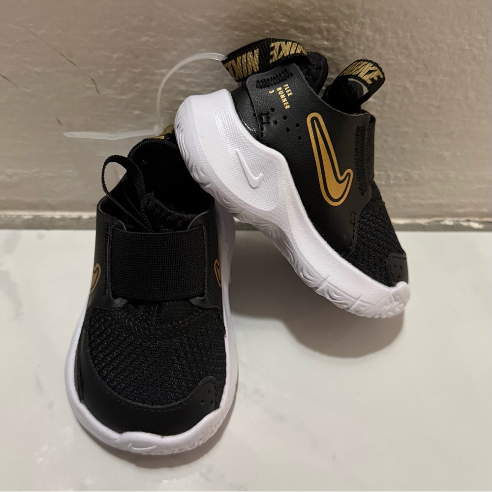 Nike Kids Black and Gold Sneakers